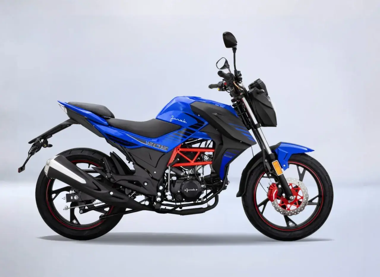 Niebieski motocykl JURAK 125, idealny na pierwsze prawo jazdy od 14 lat. Sportowy wygląd i czerwone detale.